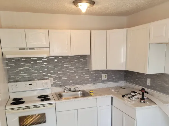 Kitchen updated with tile backsplash