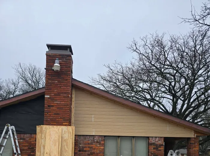 Fascia board repair in progress on a DFW home